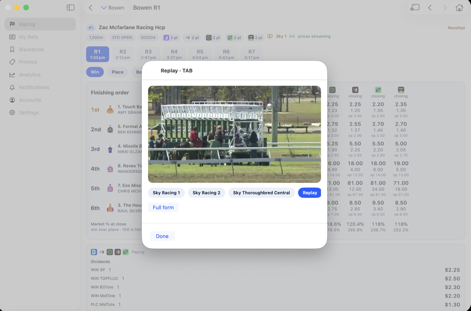 A race replay open over a resulted card on the Mac.